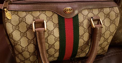 how can you tell gucci bag is real|gucci purse real.